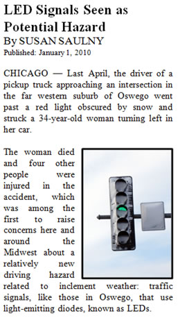 Snow obscures traffic signals